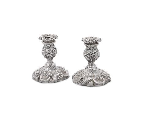 
	
		A MATCHED PAIR OF VICTORIAN SILVER CANDLESTICKS
		JENKINS &amp; TIMM, SHEFFIELD 1893 AND GOLDSMITHS &amp; SILVERSMITHS C