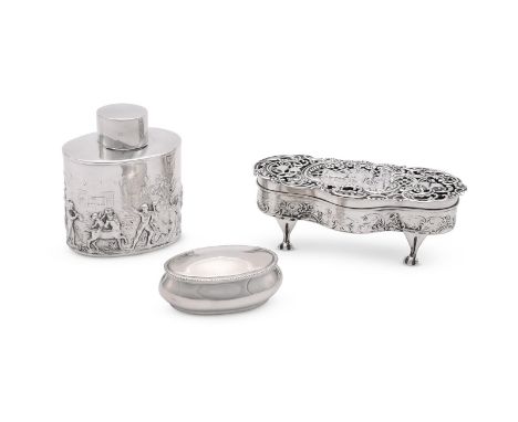 
	
		THREE SILVER ITEMS
		To include: an Edwardian shaped oval dressing table box by William Comyns, London 1907, embossed an