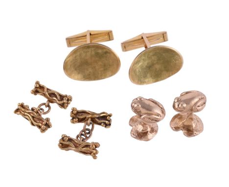 
	
		THREE PAIRS OF GOLD COLOURED CUFFLINKS
		The first pair with seated frog and lily pad terminals, the bars stamped 9ct; t