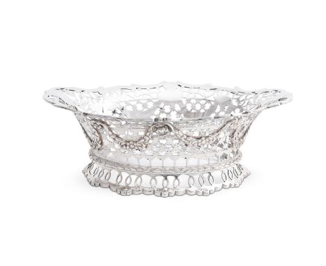 
	
		A LATE VICTORIAN SILVER SHAPED OVAL BASKET
		DANIEL &amp; JOHN WELLBY, LONDON 1899
		With a C-scroll border, pierced wit