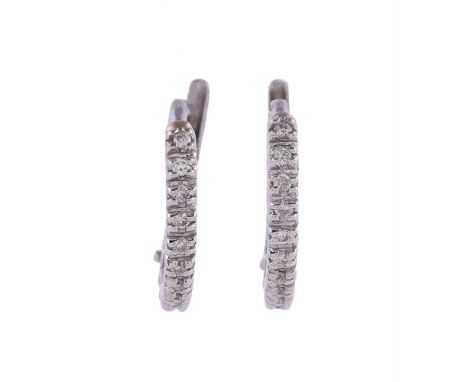 
	
		A PAIR OF DIAMOND HALF HOOP EARRINGS
		The fronts with brilliant cut diamonds in four claw settings, approximately 0.11 