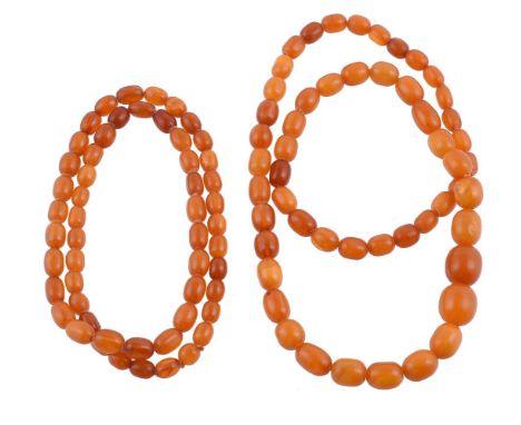 
	
		TWO AMBER BEAD NECKLACES
		The necklaces both with graduated oval amber beads
		Size/dimensions: first, beads measuring 