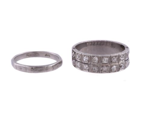
	
		A DIAMOND TWO ROW RING
		The front panel with two rows of old mine cut diamonds in squared settings, approximately 0.70 