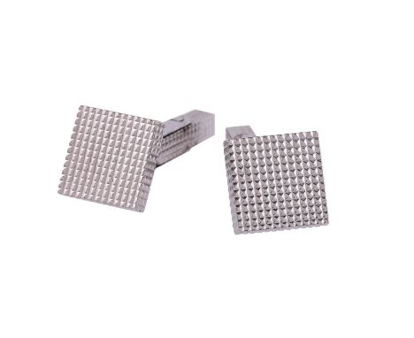 
	
		A PAIR OF 9 CARAT WHITE GOLD CUFFLINKS 
		LONDON 1992 
		The square engine turned panels to swivel terminals, makers mar