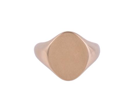 
	
		A GOLD COLOURED SIGNET RING
		The oval panel to tapered polished shoulders, stamped 9 375, with makers mark CG&amp;S
		S