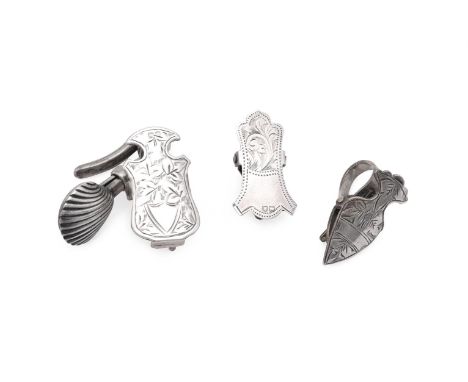 FOUR SILVER NAPKIN CLIPS To include: a Victorian napkin clip by Frederick Venour &amp; Son, Chester 1890, with a hook fitting