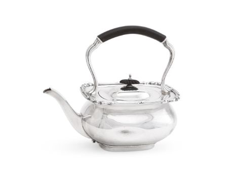 
	
		A SILVER OBLONG BALUSTER KETTLE
		MAKER'S MARK OBSCURED, BIRMINGHAM 1946 
		With a wood loop handle and lobed finial, a 