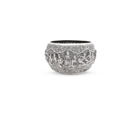 
	
		A BURMESE SILVER BOWL
		UNMARKED, CIRCA 1880
		Chased with seated and dancing figures among foliage, engraved beneath wi