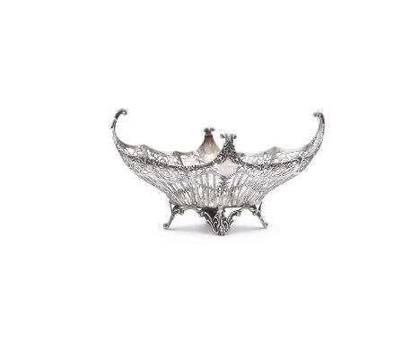 
	
		A SILVER OVAL PIERCED BASKET
		JOSIAH WILLIAMS &amp; CO., LONDON 1919
		With a chased foliate border, the pierced body w
