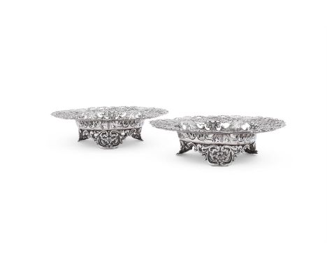 
	
		A PAIR OF AMERICAN SILVER COLOURED PIERCED SHAPED CIRCULAR DISHES
		J. E. CALDWELL &amp; CO., STAMPED STERLING 4918
		Wi