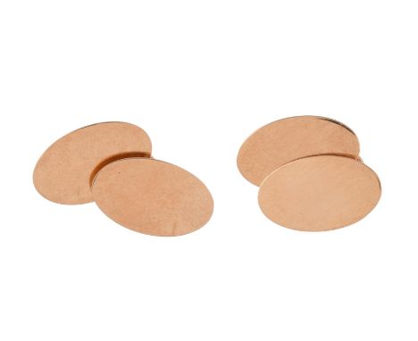 
	
		DEAKIN &amp; FRANCIS, A PAIR OF GOLD COLOURED CUFFLINKS
		The polished oval panels with belcher link connectors, stamped