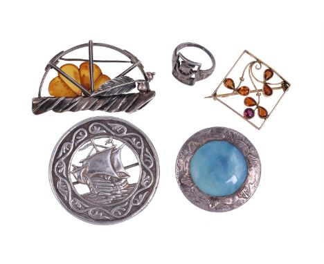 
	
		JOHN McGILVRAY &amp; SON, IONA, A SILVER GALLEON BROOCH 
		GLASGOW 1922
		The pierced circular brooch with a central Cel