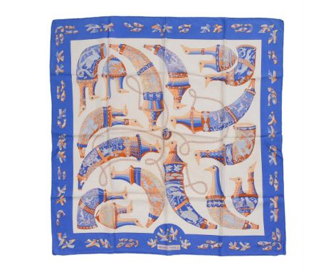 
	
		HERMÈS, RHYTONS, A SILK SCARF
		With cream ground and blue border, rolled hand stitched edges
		Dimensions: 89cm x 89cm
