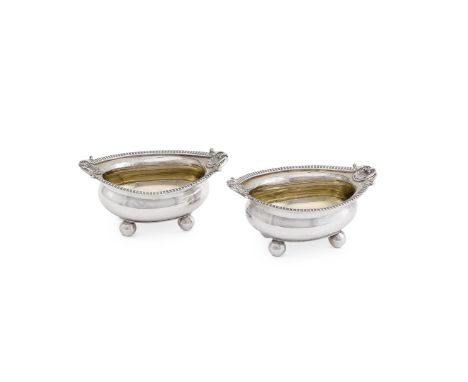 
	
		A PAIR OF GEORGE III SILVER OVAL SALT CELLARS
		SOLOMON HOUGHAM, LONDON 1808
		The gadrooned borders with shell and foli