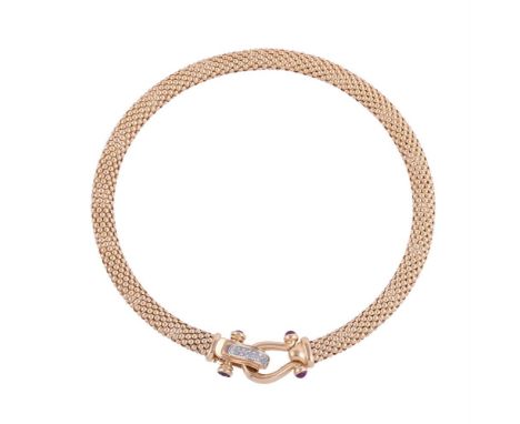 
	
		A RUBY AND DIAMOND SET COLLAR NECKLACE
		The fancy link gold coloured collar with a hinged diamond set hinged hook clasp