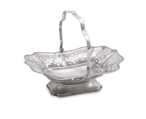 
	
		AN EDWARDIAN SILVER SWING HANDLED SHAPED OBLONG DISH
		ATKIN BROTHERS, SHEFFIELD 1907
		With a shaped swing handle, a sh