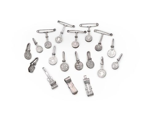 EIGHTEEN ASSORTED SILVER NAPKIN CLIPS G. E. WALTON &amp; CO. LTD (GEORGE EDWARD WALTON), VARIOUS DATES Various patterns inclu