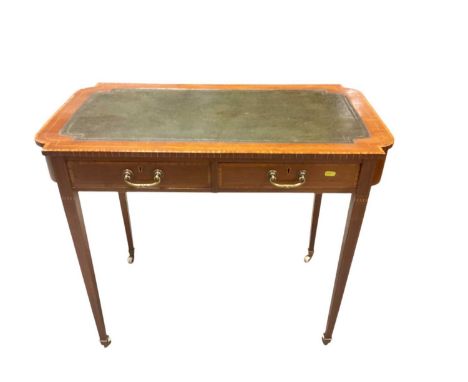Inlaid mahogany writing table with inset leather lined top and two drawers below on square taper legs and ceramic castors, 91