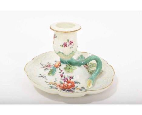 Derby chamber candlestick, circa 1756, painted with floral sprays, with moulded branch and leaf decoration, 13cm diameterHas 