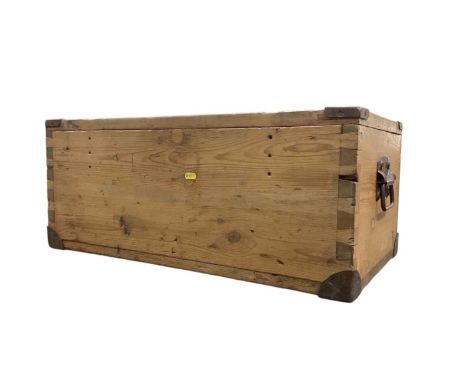 Old pine trunk with metal side handles, 74cm wide, 41cm deep, 31cm high
