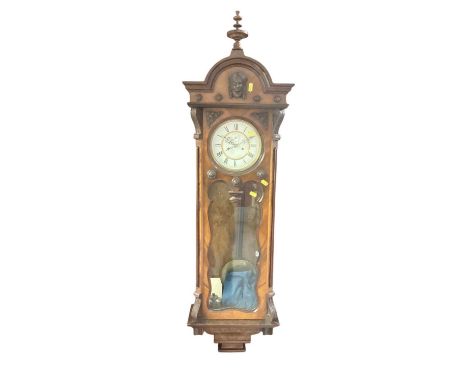 Walnut cased Vienna regulator wall clock.One other broken finial and one finial completely missing. No signs of woodworm. Ple