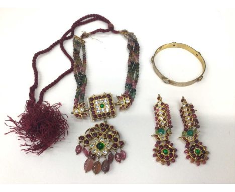 Indian tourmaline bead and gem set pendant necklace and pair of matching earrings, together with a gilt metal gem set bangleT