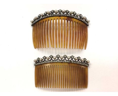 Two vintage hair combs with simulated pearl and paste set mountsBoth appear to be blonde tortoise shell.Overall good conditio