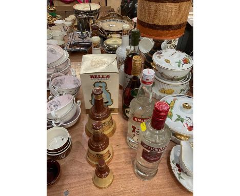 Group of Bells whisky bells, two bottles of Smirnoff vodka and other alcohol