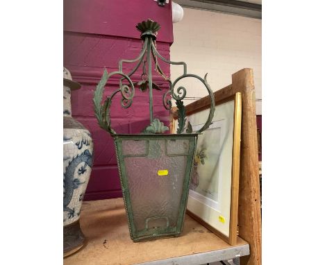 Metal framed hall lantern with frosted glass panels.