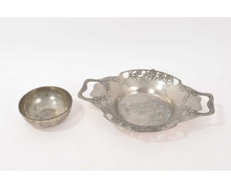 Tudric pewter twin handled pierced dish, pierced and moulded with shamrocks, 28cm wide, no. 0287, and a hammered Liberty and 