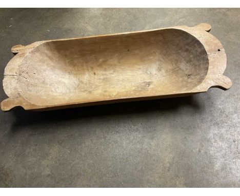 Carved dough trough