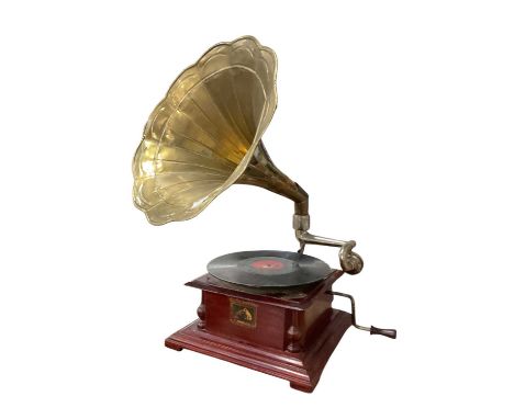Vintage HMV gramophone with brass hornThe motor does run and it does play but will require adjustment / setting up to play sm
