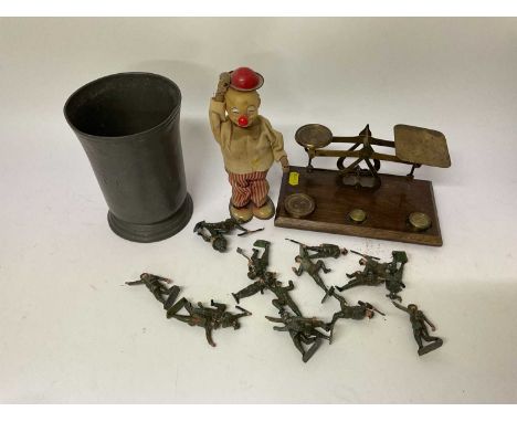 Japanese tinplate toy 'Joe's Hamburger', group of lead soldiers, set of postal scales and an antique pewter mug