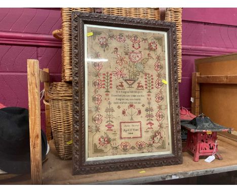 Victorian needlework sampler by Anne Davies, aged 15 years, dated 1844, in glazed frame.