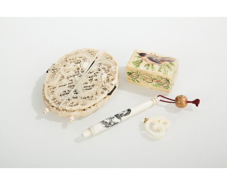 CHINESE CANTON IVORY PHOTOGRAPH FRAME
with two double doors opening to reveal a portrait oval, with pierced dragon decoration