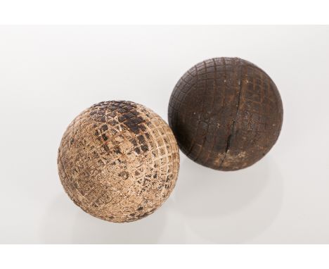VINTAGE A1 BLACK GUTTY GOLF BALL
size 27, circa 1880, together with a vintage white golf ball
