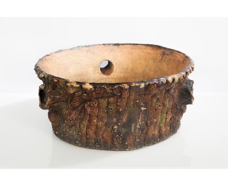ENGLISH MAJOLICA PLANTER
of naturalistic form modelled as the base of a tree trunk, 44cm diameter
