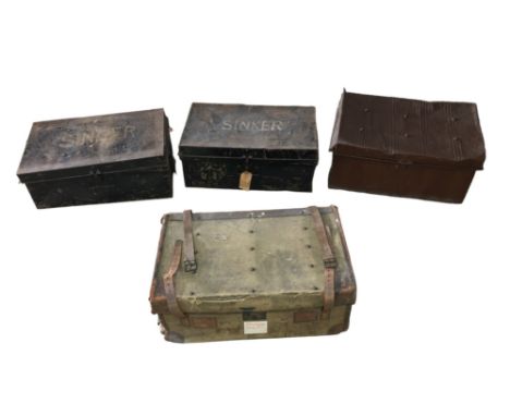 A group of vintage luggage, including three tin trunks. (4) 