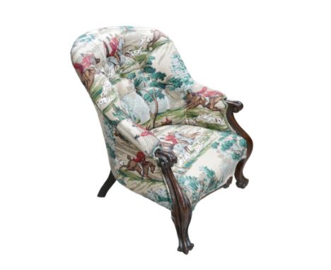 A 20th century mahogany show frame armchair, with upholstered with a hunting themed print, button back with cabriole legs, 69