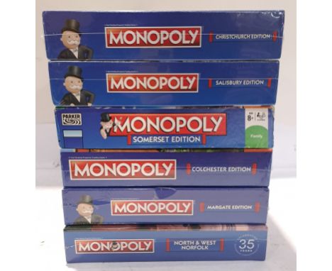 Hasbro, a boxed Group of Location Themed Monopoly Sets. Includes North &amp; West Norfolk, Salisbury with others. Although un