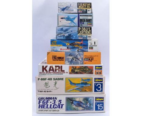 Hasagawa a boxed 1:72/1:32 scale group of military vehicles and aircraft model kits to include; Grumman F6F-3/5 Hellcat, as w