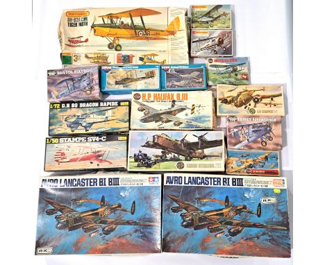 Tamiya, Airfix, Heller, Matchbox and similar, a boxed group of mixed scale plastic military kits to include Tamiya 1:48 scale