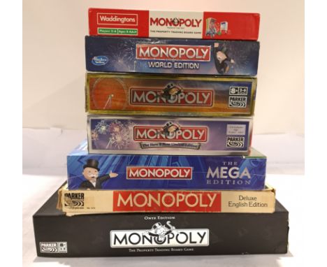 Hasbro, a boxed Group of Monopoly Sets. Includes Onyx Edition, Here &amp; Now World Edition with others. Although unchecked f