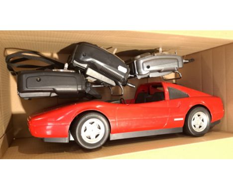 Mattel, a unboxed Ferrari with a Trio of RC Remote Controls. Although unchecked for completeness or if in working order condi