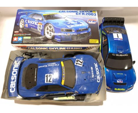 Tamiya, a boxed 1:10 Scale Calsonic Skyline GT-R 2003 TT-01 Chassis RC Model Kit. Although unchecked for completeness or if i