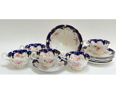 A John Ridgway &amp; Co Cauldon Place gilt bone china 'Chantilly' part tea set with blue underglaze decoration and hand ename