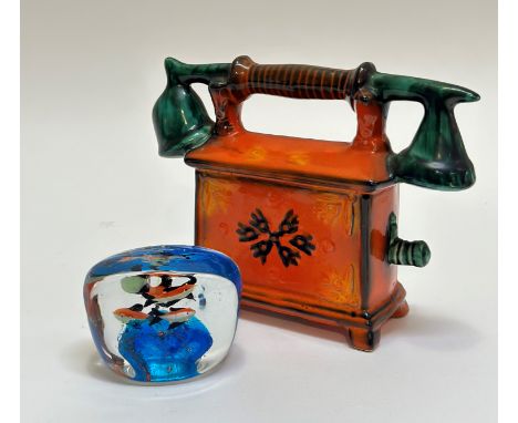 A ceramic telephone money-box with orange and green decoration (w- 21cm h- 17cm) and a under water scene paper weight of five