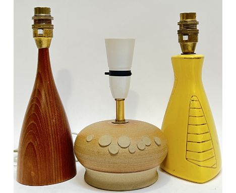A group of three lamp bases comprising a squat form studio pottery lamp base with applied bubble style decoration (h- 21cm in