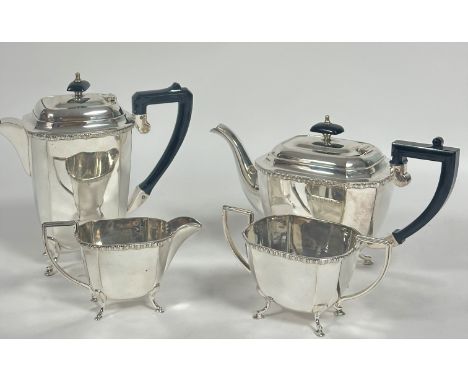 A four piece Epns tea and coffee set of tapered panel form raised on pad feet, (coffee pot H x 22cm), (4)