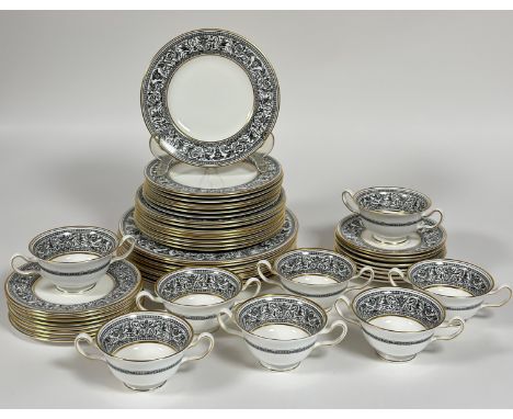 A Wedgwood Florentine Black Dragon decorated part dinner service comprising eight side plates (w- 21cm), eight plates (w-23cm